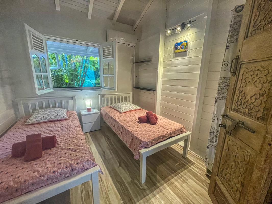 21.Location villa piscine St François Guadeloupe_Chambre 1